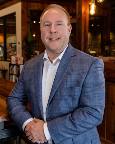 a man wearing a suit and tie
