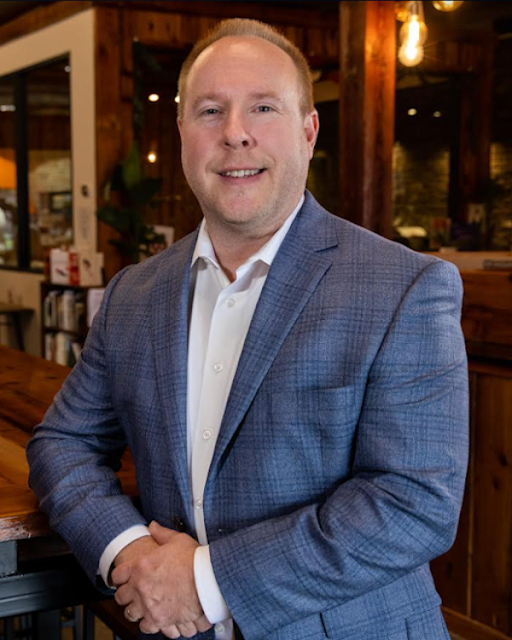 a man wearing a suit and tie