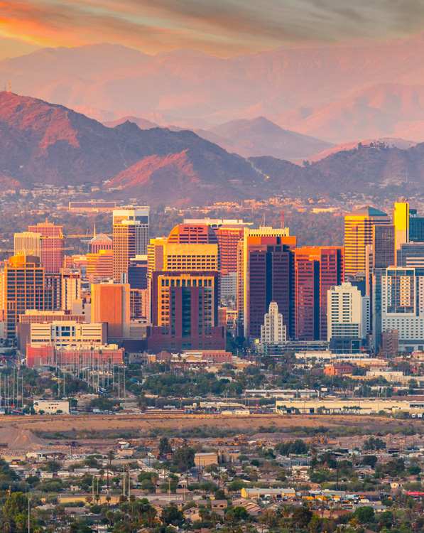 a view of a city with a mountain in the background