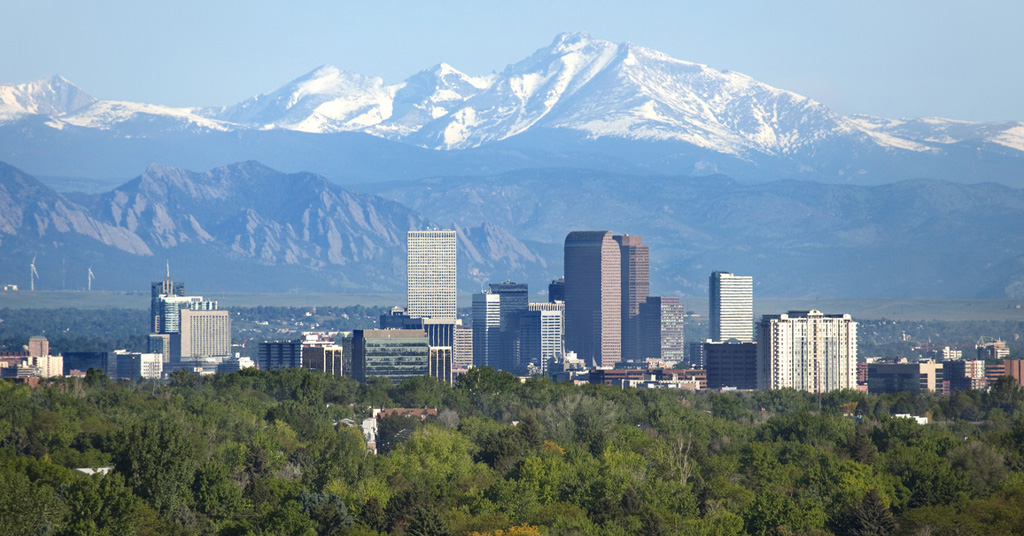a view of a city with a mountain in the background