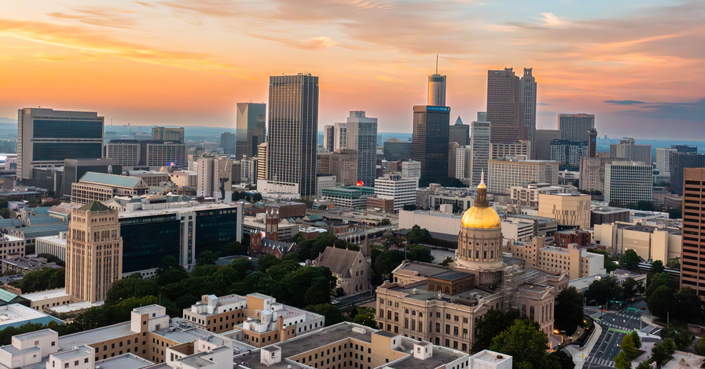 a sunset over a city