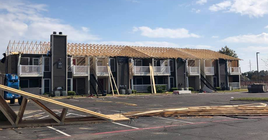 a small house in a parking lot