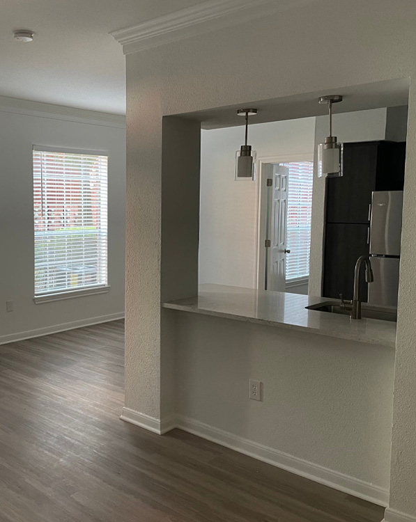 a kitchen with a sink and a window