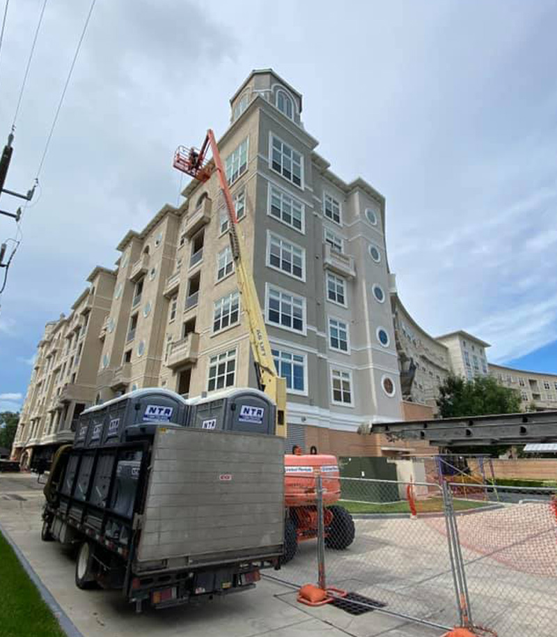 a person standing in front of a building