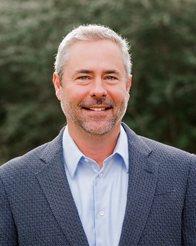 a man wearing a suit and tie