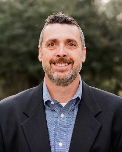 a man wearing a suit and tie