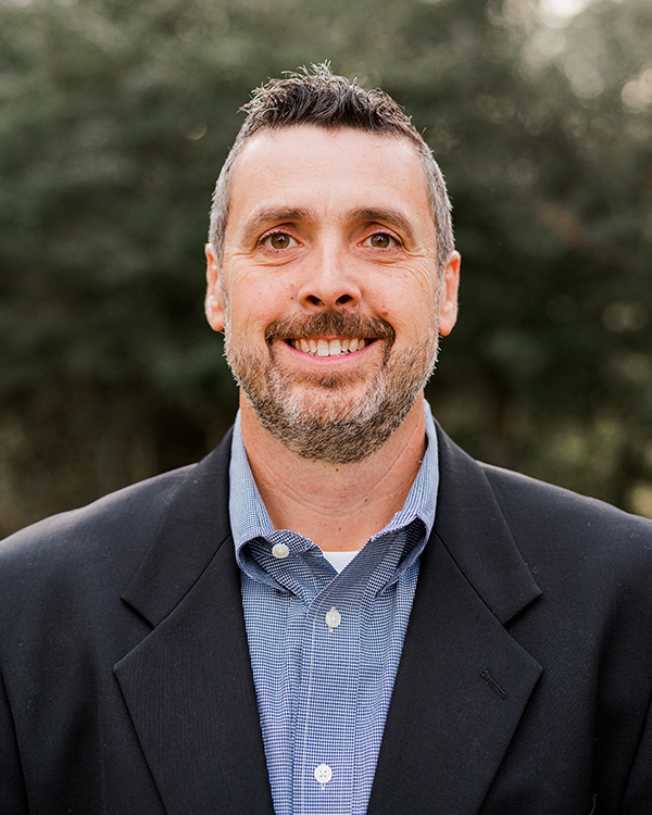 a man wearing a suit and tie