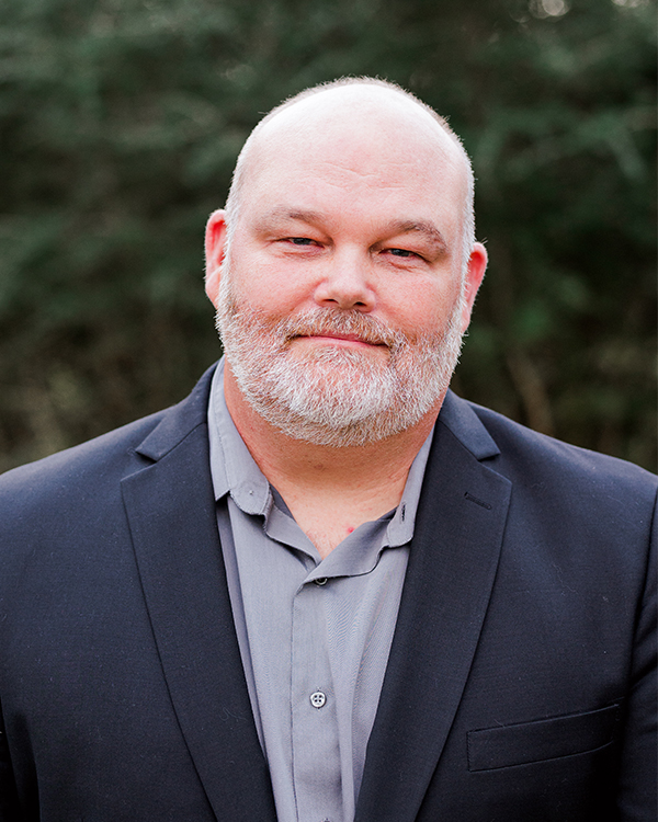 a man wearing a suit and tie