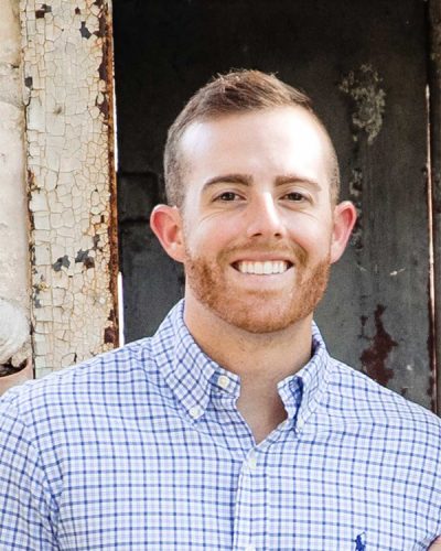 a man smiling for the camera